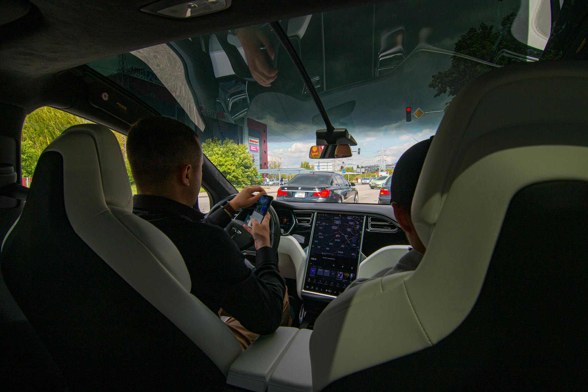 student driving electric car
