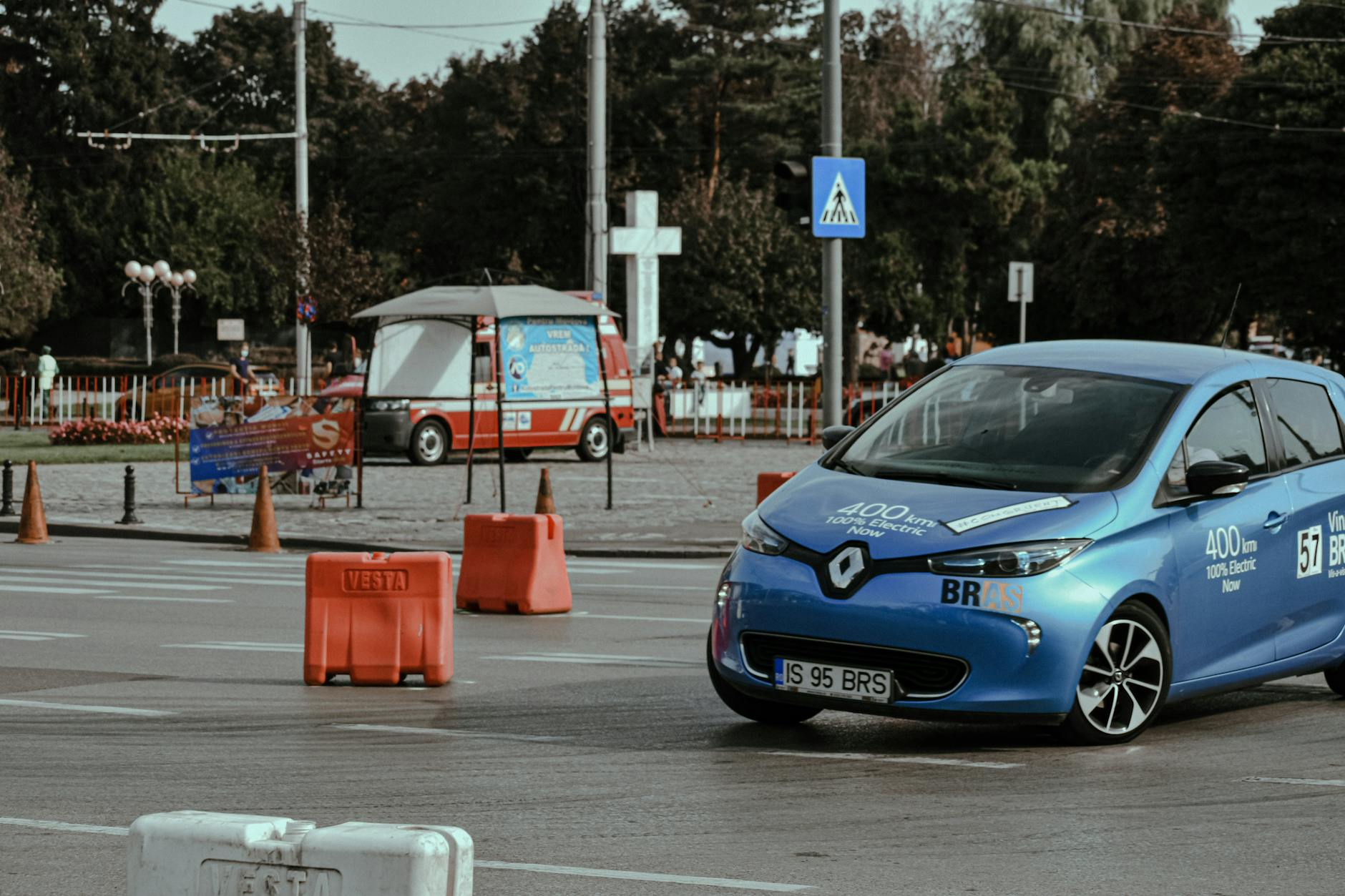 student driving electric car